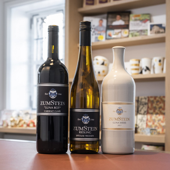 Three bottles of &quot;Zumstein wine&quot; in the museum store