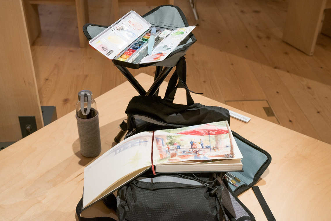 Skizzenbuch auf Klappstuhl